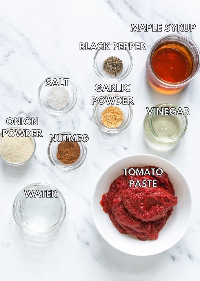 the ingredients to make tomato paste on a white marble countertop with text overlay