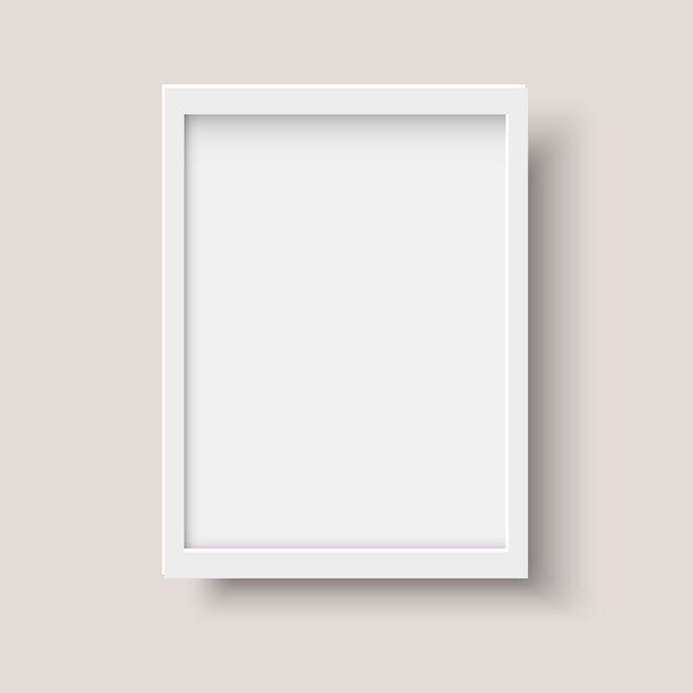 an empty white frame hanging on the wall