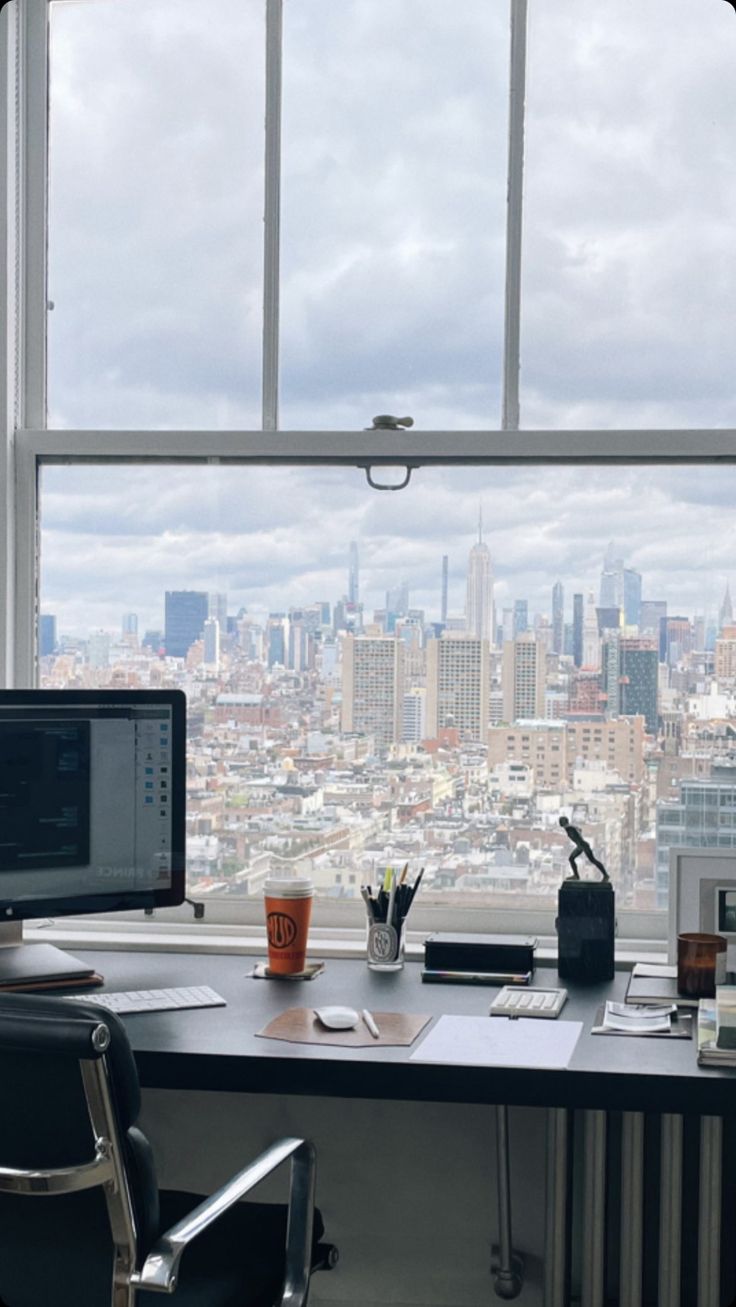 an office with a view of the city