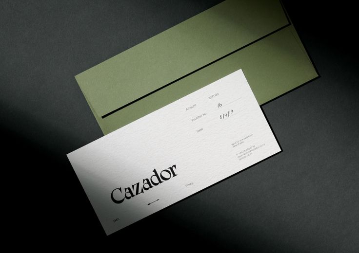 two business cards with the word cazador printed on one side and the letter c on the other