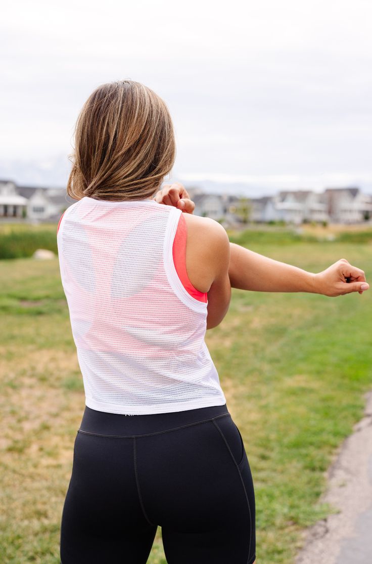 This crop top was designed to make EVERY body type feel confident and comfortable. It is MUCH Longer than a typical crop so it will keep you covered, but give you that slimming look of a shorter tank! The crop reaches our high-wasted bottoms making it the perfect starter crop top to add to your workout collection even if you have never felt confident enough for a crop just yet! The v-neckline is flattering and provides perfect coverage. The mesh detailing is thick enough to feel like you are cov Spring Crop Top With Built-in Bra For Gym, Moisture-wicking Crop Top Activewear For Summer, Casual Training Crop Top With Built-in Bra, Spring Sports Crop Top With Built-in Bra, Functional Sleeveless Crop Top With Built-in Bra, Spring Cropped Moisture-wicking Activewear, Cropped Moisture-wicking Activewear For Spring, Spring Moisture-wicking Cropped Activewear, Cropped Training Tops With Built-in Bra