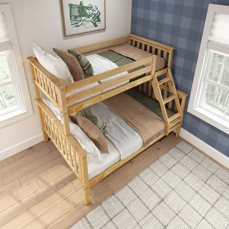 a wooden bunk bed sitting in a bedroom next to two windows