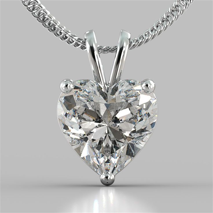 Overwhelm her with joy with this breathtaking heart cut solitaire pendant.Exquisitely made according to your selection of precious metal, this magnificent solitaire pendant comes with a 16"-18" Adjustable Diamond Cut Cable Chain included and can be customized to your exact specifications to accommodate a Lab Grown Diamond diamond of up to 5 carats in size. The base price includes a 1.0CT Solitaire in 14K Solid Gold.Please select your choice of Precious Metal, Stone Size and Chain preference from the drop-down menus above. Heart Cut Solitaire Pendant With 16"-18" Adjustable Diamond Cut Cable Chain Stone Size: Up to 5 carats Stone Clarity: VS1 or Better Color: G or Better Available in 14K, 18K or Platinum Model:HRTSP-LG Luxury Silver Solitaire Necklace With Cable Chain, Luxury Silver Heart Cut Wedding And Engagement Jewelry, Luxury Heart Pendant Solitaire Necklace For Anniversary, Luxury Vvs Clarity Solitaire Necklace, Luxury White Gold Solitaire Heart Cut Necklace, Luxury Heart Pendant Solitaire Necklace, Luxury Diamond White Solitaire Necklace With Heart Pendant, Luxury Heart Pendant Solitaire Necklace With Diamond Cut, Luxury Classic Solitaire Heart Pendant Necklace