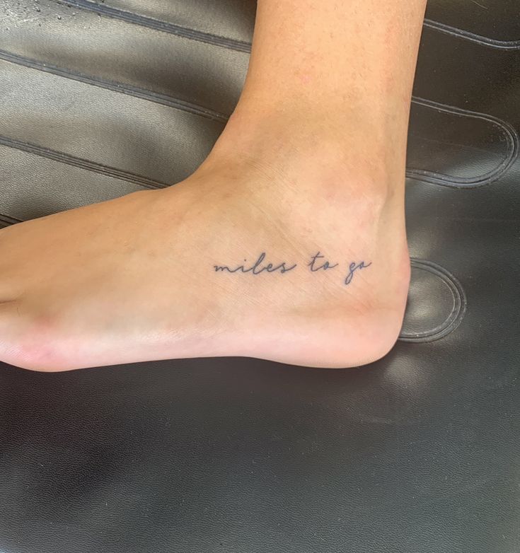 a woman's foot with the words made to go written on her left side