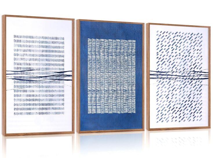 three framed art pieces with blue and white designs