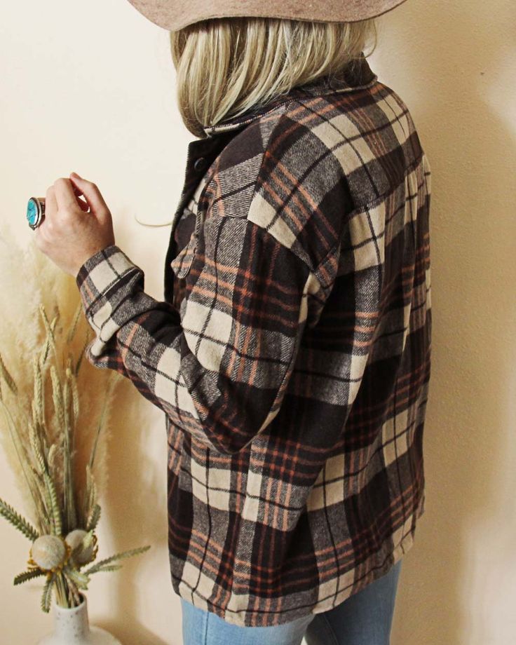 The softest sweet flannel for the season. Rich brown & rust tones pair with a button up front & cute pockets. Easy fit & perfect as is or layered. Color: Brown, cream & rust Soft poly & cotton blend Hand wash cold Small Medium Large Bust 42 44 46 Waist 42 44 46 Hips 43 45 47 Length 28 28 28 Bust, waist, and hip measurements are a total circumference. Length is measured from the top of the shirt to the hem. Measurements are an estimate. Everyday Button-up Tops For Fall, Vintage Brown Tops For Everyday, Vintage Brown Tops For Everyday Wear, Fall Flannel Shirt With Button Closure, Brown Button-up Cotton Flannel Shirt, Brown Button-up Flannel Shirt For Fall, Brown Tops For Casual Gatherings In Fall, Fall Flannel Tops With Buttons, Fall Flannel Shirt For Casual Gatherings