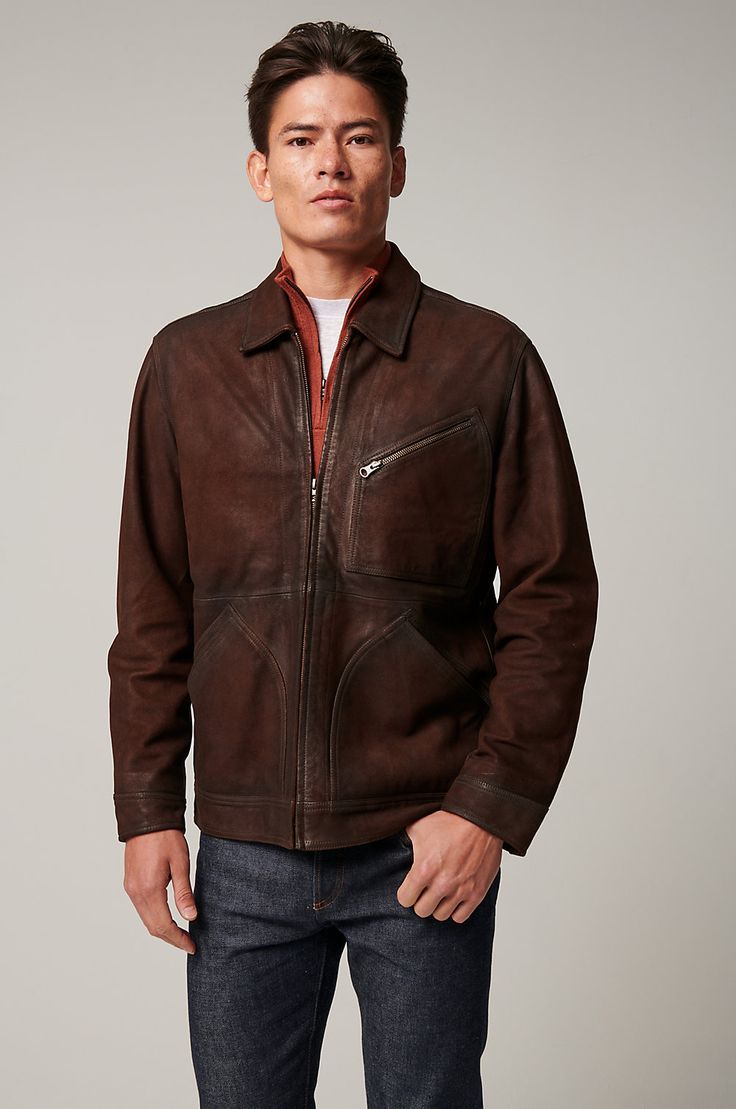 With the memorable look of a time-honored favorite, the Gallatin goatskin suede jacket is easy on the eye and handcrafted to endure for decades. Its hand-rubbed seams give it a distinct finish that develops with age, and its antiqued metal buttons on the cuffs and on the adjustable waist tabs complement a jacket destined to become a wardrobe essential. Rugged Suede Leather Jacket For Fall, Leather Jacket With Suede Overlays, Leather Jacket With Suede Lining, Fitted Leather Jacket With Suede Overlays, Brown Leather Jacket With Suede Overlays, Leather Jacket With Suede Lining For Fall, Fall Leather Jacket With Suede Lining, Leather Jacket With Suede Lining For Work, Brown Leather Jacket With Suede Lining