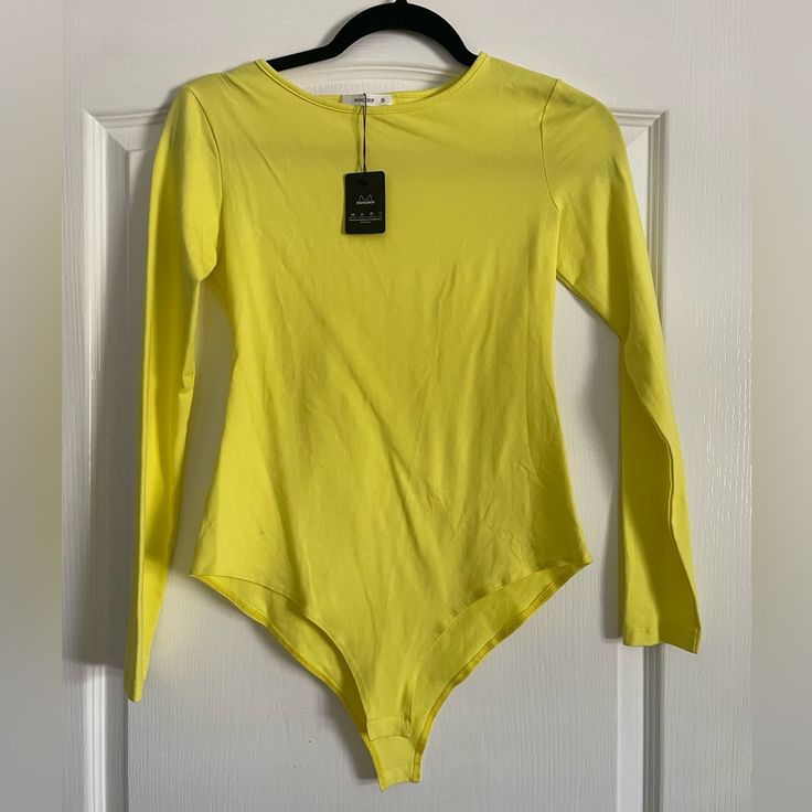 Bright Yellow Mangdiup Long-Sleeve Bodysuit In Small, Never Worn. New With Tags Spring Solid Long Sleeve Bodysuit, Spring Long Sleeve Solid Bodysuit, Spring Long Sleeve Bodysuit, Fitted Crew Neck Bodysuit For Spring, Casual Long Sleeve Solid Bodysuit, Fall Cotton Bodysuit, Casual Long Sleeve Solid Color Bodysuit, Spring Trendy Crew Neck Bodysuit, Trendy Cotton Crew Neck Bodysuit