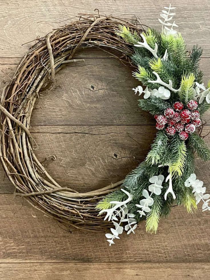 a christmas wreath on a wooden surface