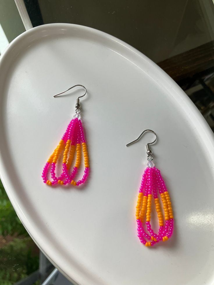 Colors of pink and orange- medium size Adjustable Pink Teardrop Beaded Earrings, Pink Beaded Teardrop Jewelry, Pink Teardrop Beaded Jewelry, Pink Teardrop Earrings For Beach, Vibrant Orange Summer Earrings, Pink Beaded Earrings With Ear Wire For Summer, Pink Beaded Teardrop Earrings, Orange Teardrop Earrings For Summer, Orange Teardrop Summer Earrings