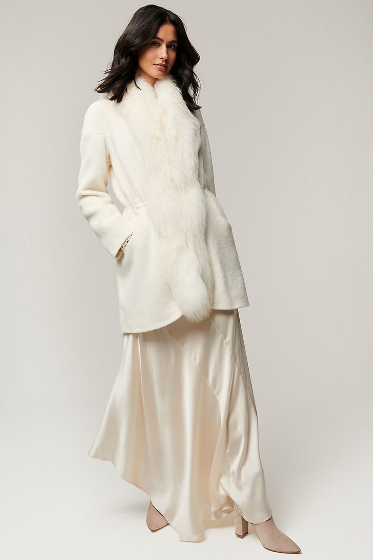 Luxurious style, warmth, and softness are yours to indulge in every day when you wear the Harlow. Made of a silky-soft blend of Suri alpaca and wool, this beautiful coat boasts plush Asiatic raccoon fur trim along the collar and tuxedo front, keeping you extra insulated from chilly winds—not to mention making you look fabulous! Flatter your figure by pulling the inner drawstring waist, and enjoy all-day comfort thanks to satin lining. Hook-and-eye closures and two generous front pockets complete English Winter, Rehearsal Dinner Looks, Coat With Fur Trim, Dinner Looks, Mountain Ranch, Coat With Fur, Beautiful Wardrobe, Suri Alpaca, Reversible Coat