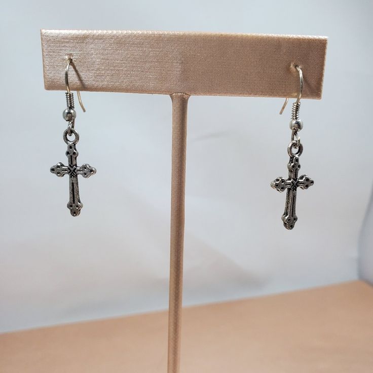 Nwot, 1 1/2 Long By 1/2 Wide Cross Silver Drop Earrings. Very Elegant For Everyday Wear. Thank You For Visiting My Closet And Please Bundle To Save More Money. Prices Are Over 70 Percent Below Wholesale Price. Again, Thank You And Follow Me To See Weekly Listings And Updates. Silver Drop Earrings, Silver Cross, More Money, Everyday Wear, Jewelry Earrings, Women Jewelry, Drop Earrings, Money, Thank You