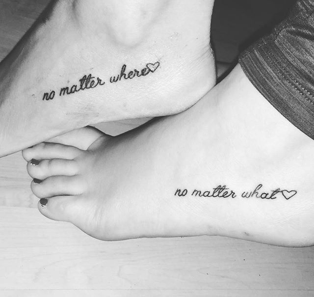 two people with tattoos on their feet that say no matter who they are going to