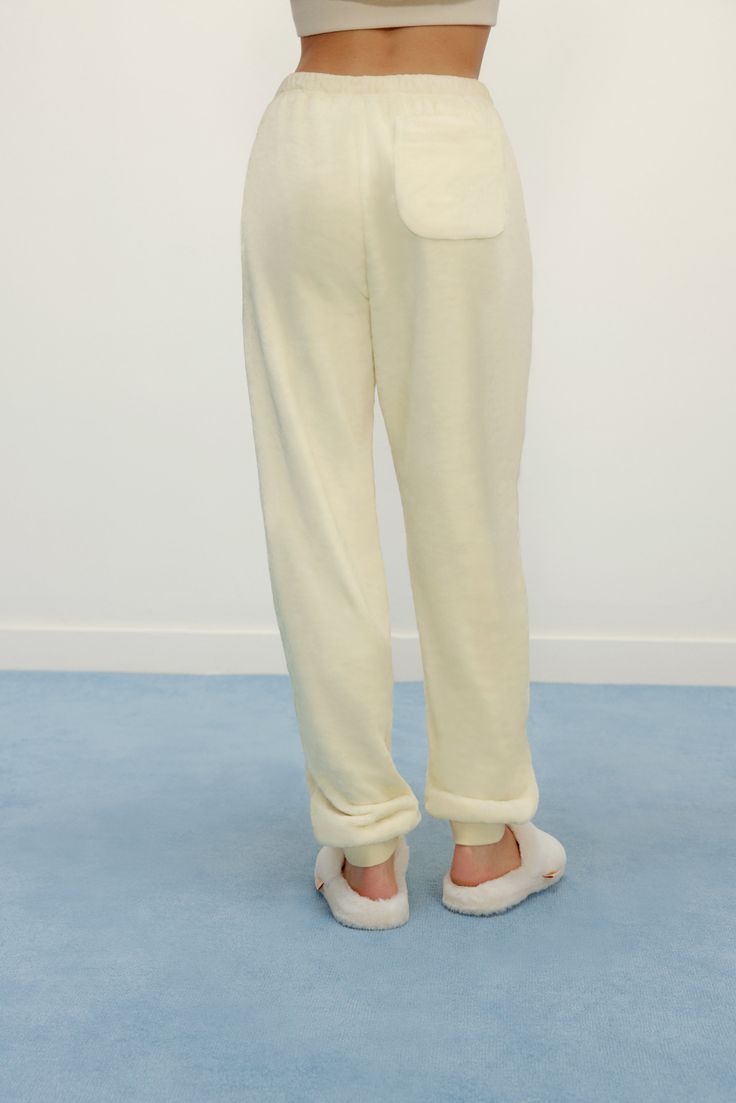 They're back: the essence of timeless comfort, these cute Classic Cozy Fleece Pajama Pants 2.0 are now available in new colors! Exactly the classic PJ style you need to stay warm and cozy at home this or any season. Details Materials & Care Shipping & Returns • Thick, fluffy fleece material, now in two new colors.• Comfortably loose fit with a rear pocket and elastic waistband & cuffs. Size M is 39.2" in length.• Pair with the matching Classic Cozy Fleece Pajama Top 2.0 to complete the set! • Ma Cozy At Home, Fleece Pajama Pants, Fleece Pajamas, Pajama Top, Stay Warm, Warm And Cozy, New Color, Harem Pants, Pajama Pants