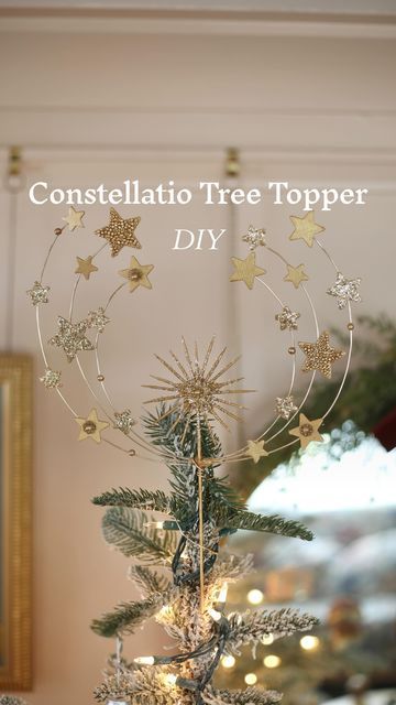 a christmas tree with gold stars on it and the words, constelatio tree topper diy