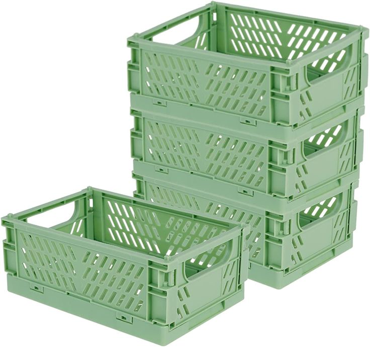 three green plastic crates sitting next to each other