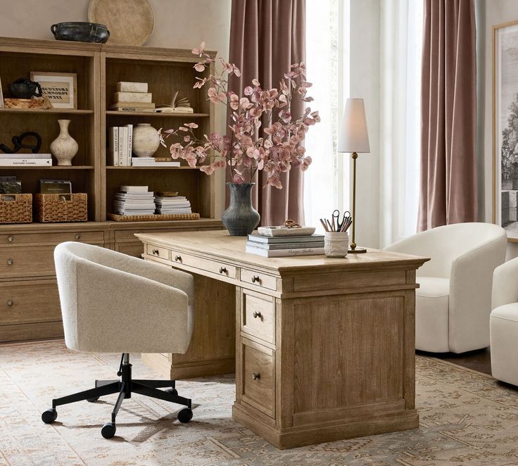 a home office with a desk, chair and bookshelf