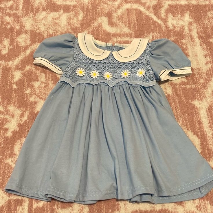 Size: 12-18 Months Color: Baby Blue Blue Cotton Dress For Playwear, Cute Blue Cotton Dress, Blue Spring Dress For Playdate, Playful Light Blue Dress For Playtime, Blue Dress For Playdate In Spring, Playful Blue Dress For Playtime, Light Blue Dresses For Playtime, Blue Spring Dresses For Playwear, Spring Blue Dresses For Playwear