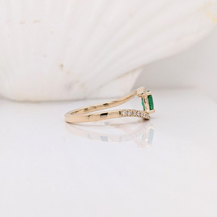 This beautiful classic ring features a Zambian emerald in solid 14k yellow gold. A fancy ring design perfect for an eye-catching engagement or anniversary. This ring also makes a beautiful birthstone ring for your loved ones. This ring is made with solid 14K Gold and naturally Earth-mined SI / G-H diamonds. As listed, this ring is ready to ship. If you're interested in purchasing this setting with a different center stone please message us! 14k Yellow Gold Emerald Ring For Promise, 14k Gold Emerald Promise Ring, May Birthstone, 14k Gold Emerald Ring For Promise, May Birthstone, 14k Gold Emerald-cut Stackable Rings For May Birthstone, 14k Gold Stackable Emerald-cut Rings For May Birthstone, Emerald Solitaire Ring For Promise, 14k Gold Emerald Cut Rings For May Birthstone, Promise Emerald Ring In Yellow Gold, Emerald Cut Promise Ring In Emerald