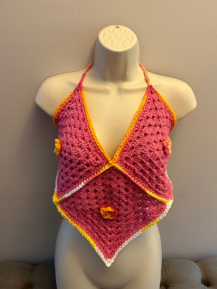 Crocheted bohemian top. One size fits most Festival Crochet V-neck Crop Top, Spring Festival V-neck Halter Top, Bohemian Cotton Crochet V-neck Top, Bohemian V-neck Crop Top For Beach Season, Fitted V-neck Top For Festival, Bohemian V-neck Halter Top For Summer, Summer Festival V-neck Halter Top, Spring Festival Crochet Top With Crochet Trim, Spring Beach Tops With Boho Collar