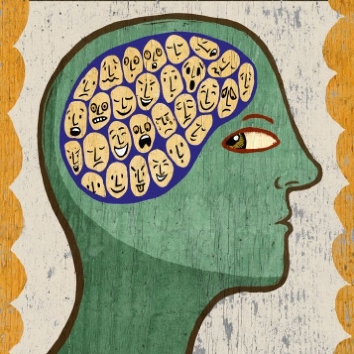 a drawing of a person's head with many faces and numbers in the brain