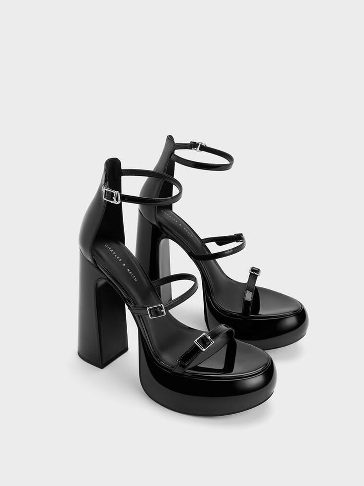 Stay ahead of the style curve when you accessorise with the Elvina platform sandals. From the chunky platform base and formidable 13cm tall block heels to the glossy black patent finish, they are a fashionable force to be reckoned with. Featuring a trio of skinny adjustable straps that are as stylish as they are functional, they offer a secure and comfortable fit for all-day wear. Chunky Sandal Heels, Charles And Keith Shoes, Boots With Heels, Classy Shoes, Faux Leather Heels, Chunky Block Heels, Aesthetic Shoes, Charles Keith, Swag Shoes