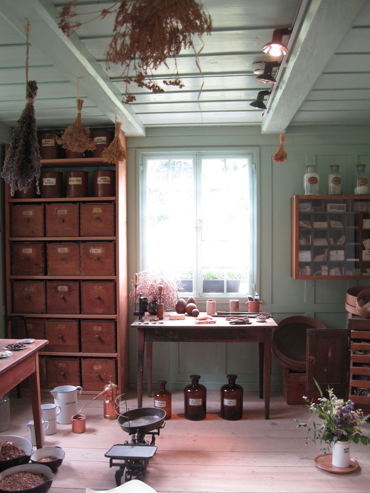 an old fashioned room with lots of clutter on the floor