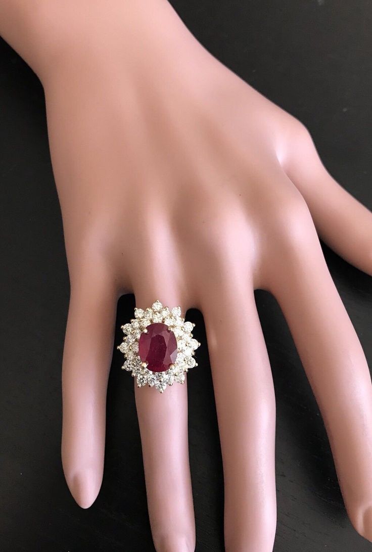 8.40 Carats Impressive Red Ruby and Diamond 14K Yellow Gold Ring Suggested Replacement Value $6,900.00 Total Red Ruby Weight is: Approx. 6.50 Carats (Treated: Lead Glass Filling) Ruby Measures: 11.00 x 9.00mm Natural Round Diamonds Weight: Approx. 1.90 Carats (color G-H / Clarity SI1-SI2) Ring total weight: 8.5 grams Disclaimer: all weights, measurements and colors are approximate and may vary slightly from the listed dimensions or as seen in the image. All pictures are magnified to show the sma Luxury Red Cluster Diamond Ring, Formal Red Rings, Formal Cluster Ruby Ring, Red Brilliant Cut Diamond Ring For Formal Occasions, Red Brilliant Cut Diamond Ring For Formal Events, Red Diamond Ring For Formal Occasions, Classic Red Cluster Diamond Ring, Formal Red Gemstone Brilliant Cut Diamond Ring, Gia Certified Red Diamond Ring For Formal Occasions