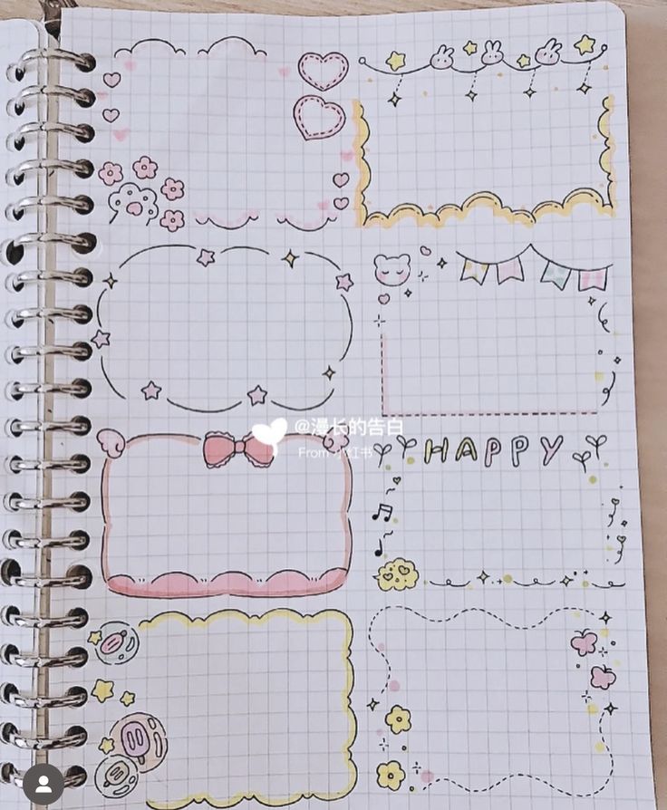 an open notebook with doodles on it