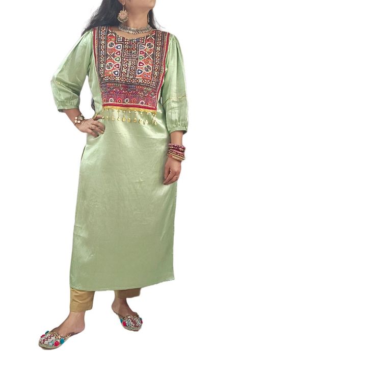 Experience Fashionable elegance with this Mashroo Cotton Silk Kutchi hand embroidered mirror work Jacket crafted from superior cotton silk blend for comfort and breathability. The Kutchi hand embroidered on its front crafted by artisans of Kutch which reflects of colourful Kutch. Look & feel your best with this timeless piece. Mirror Work Jacket, Pista Green Colour, Afghani Dress, Pista Green, Work Women, Silk Kurta, Work Jacket, Straight Kurta, Women Kurta