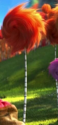 the lorax is standing in front of some trees