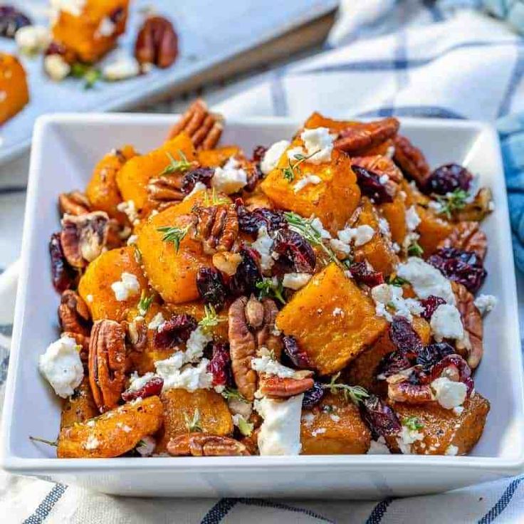 a white bowl filled with sweet potato salad