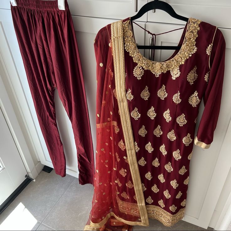 New! Comes With Three Pieces: Pajami (Pants), Kameez (Long Shirt), And Dupatta/Chunni (Scarf). Model: @Muneezy4 Size: Small Measurements: Shirt: 18” Pit To Pit, 45” Length Pants: 42” Length Use The “Buy Now” Or “Add To Bundle” Button To Purchase Festive Red Embroidered Pant Set, Red Bollywood Pant Set For Diwali, Bollywood Style Red Pant Set For Diwali, Traditional Red Pant Set With Resham Embroidery, Traditional Red Pant Set For Wedding, Traditional Red Wedding Pant Set, Embroidered Fitted Anarkali Pant Set, Fitted Embroidered Anarkali Pant Set, Elegant Fitted Dabka Pant Set