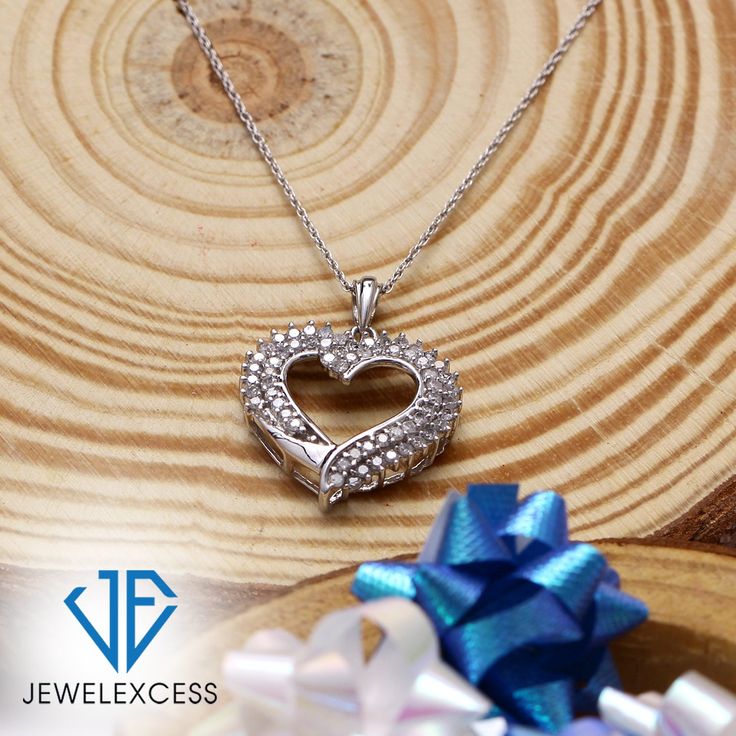 A Gift That Sparkles & Dazzles All: This timeless diamond heart pendant is sure to capture anyone’s heart. Fashioned with loads of brilliant white diamonds, this 1.00 carat heart necklace is romantic, dreamy and expertly crafted to reflect your love. Gorgeous 18 Inch Rope Chain Included: This Sterling Silver or 14K Gold-Plated Silver diamond heart necklace is beautifully suspended from a fashionable 18-inch rope chain, which is as durable as it is stylish. The chain can also be used with other p Dazzling Heart Cut Jewelry With Diamond Accents, Diamond White Heart Cut Jewelry For Valentine's Day, Round Cut Cubic Zirconia Jewelry For Valentine's Day, Fine Jewelry Cubic Zirconia For Anniversary Gift, Dazzling Diamond White Jewelry For Valentine's Day, Fine Jewelry Diamond Cut Anniversary Gift, Fine Jewelry Diamond Cut For Anniversary Gift, Diamond Cut Jewelry For Anniversary Gift, Fine Jewelry Cubic Zirconia For Anniversary