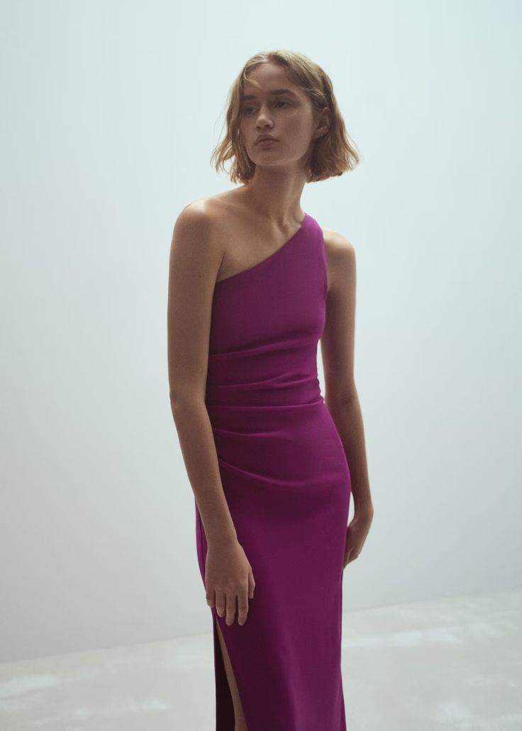 Asymmetrical maxi-bow dress - Women | Mango USA Pre-draped One Shoulder Maxi Dress For Party, Pre-draped Maxi Dress With Asymmetrical Neckline For Gala, Sleeveless Asymmetrical Dress For Wedding Guest, Chic Midi Dress With Asymmetrical Neckline For Wedding Guest, Elegant One-shoulder Dress For Wedding Guest, Elegant One-shoulder Wedding Guest Dress, Pre-draped One Shoulder Dress With Asymmetrical Hem For Party, Pre-draped One Shoulder Party Dress With Asymmetrical Hem, Chic Fitted Midi Dress For Formal Occasions