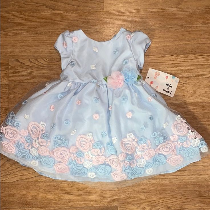 Light Blue Flower Dress. Size 12. Cuter Easter Dress! Brand New Blue Floral Applique Dress For Dress-up, Cute Blue Dresses With Floral Applique, Cute Blue Dress With Floral Applique, Blue Dresses With Floral Applique For Dress-up, Spring Floral Pink Dress For Casual, Spring Princess Playtime Dresses, Spring Pink Floral Dress, Cute Floral Dress For Spring, Blue Floral Print Playtime Dress