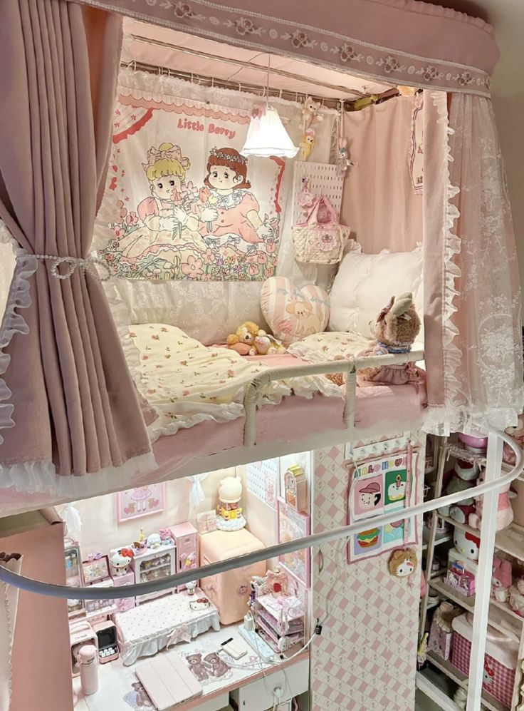 a doll house is shown with pink curtains and furniture in the room, including a bed