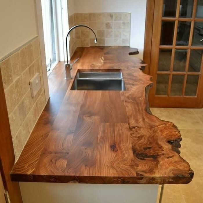 a wooden counter top in a kitchen