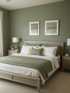 a bedroom with green walls and white bedding