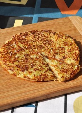 a pizza sitting on top of a wooden cutting board