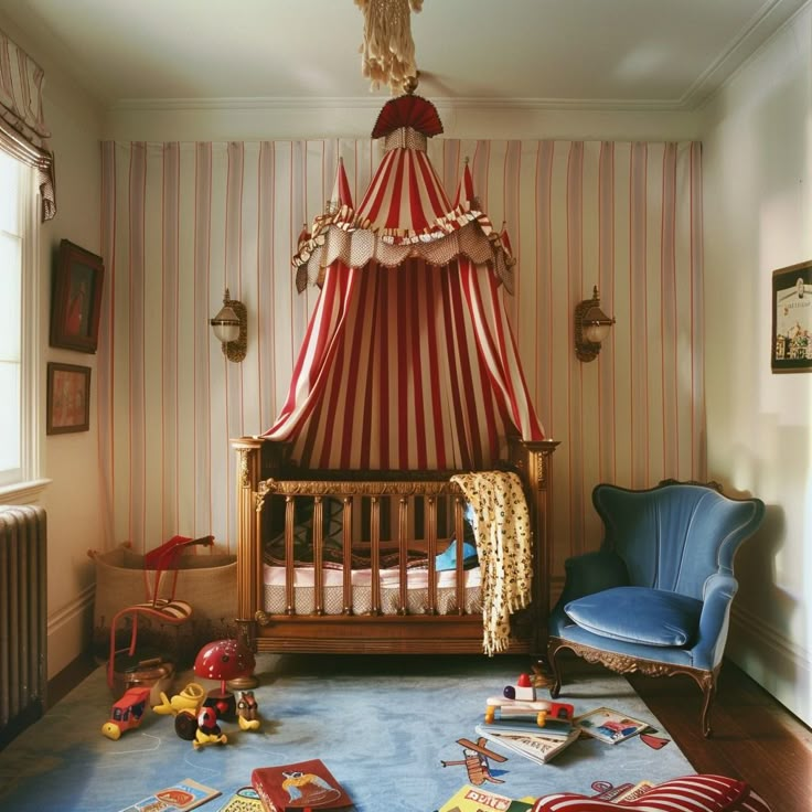 a baby's room with a canopy bed, blue chair and toys on the floor