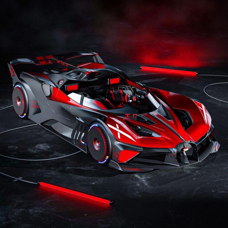 a red and black sports car in the dark