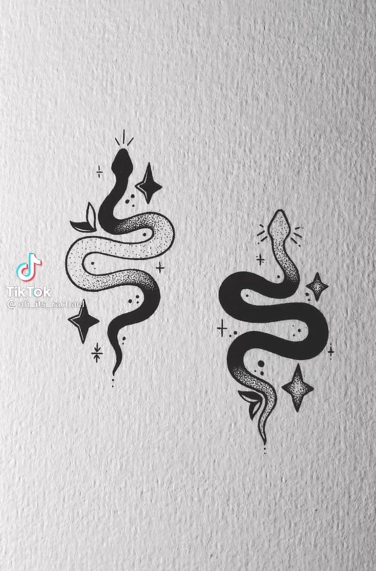 two black and white tattoos on the side of a paper with an image of a snake