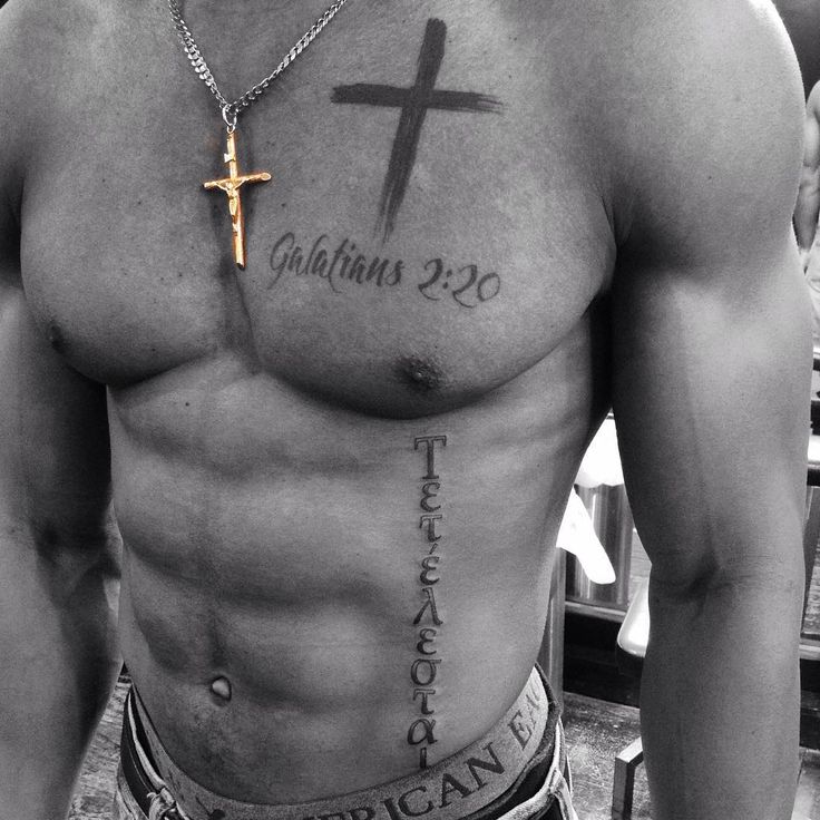 a man with a cross tattoo on his chest