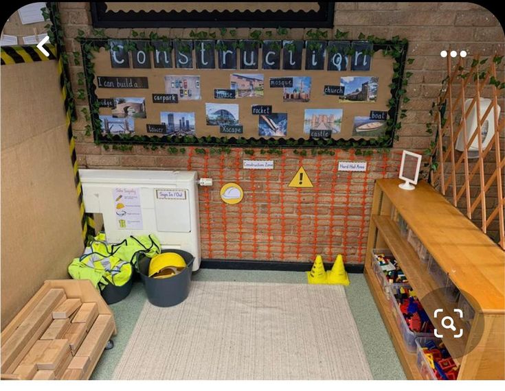 a bulletin board with construction written on it and some bins in front of it