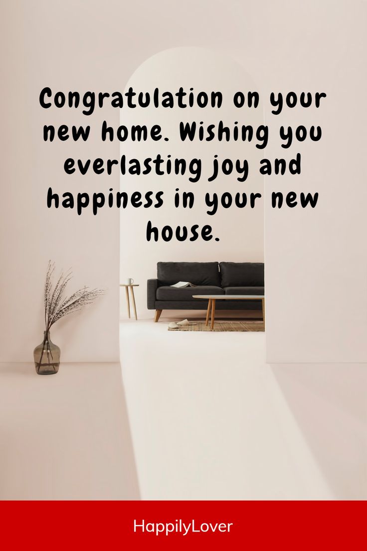 a living room with a black couch and a white wall that says congratulations on your new home wishing you everlasting joy and happiness in your new house