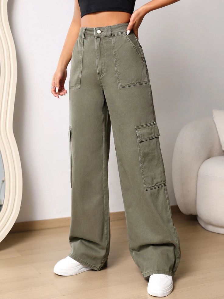 Make a bold style statement with our Flap Pocket Wide Length Jeans in an eye-catching green color. Designed with a plain pattern and wide-leg silhouette, these cargo pants-inspired jeans are a must-have for fashion enthusiasts. The zipper fly closure and natural waistline ensure a secure and comfortable fit. Details: Color: Green Pattern Type: Plain Type: Wide Leg Jeans Style: Cargo Pants Closure Type: Zipper Fly Waist Line: Natural Length: Long Fit Type: Loose Fabric: Non-Stretch Material: Deni Casual Olive Wide Leg Pants With Pockets, Olive Utility Cargo Jeans, Green Wide Leg Bottoms With Patch Pockets, Green Wide-leg Bottoms With Patch Pockets, Trendy Olive Pants For Spring, Green Cotton Cargo Wide Leg Pants, Spring Utility Style Wide Leg Pants In Khaki, Green Full-length Cargo Jeans With Patch Pockets, Green Cotton Cargo Style Wide Leg Pants