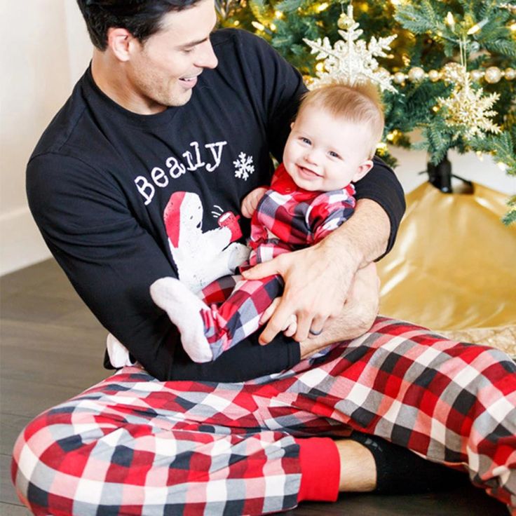 Get ready for a cozy Christmas celebration with our Bearly Plaid Family Pajama Set. Made from high-quality materials, these PJs showcase a charming bear-themed plaid pattern. Stay comfy and coordinated as you enjoy the holiday festivities together. Dress the whole family in these festive PJs for a heartwarming and picture-perfect Christmas morning.Specifications: Material: Cotton Length: Ankle-Length Pants Pattern Type: Plaid Sleeve Length(cm): Full Season: Spring Item Type: Pajamas Family Matching Holiday Festive Sleepwear, Family Matching Red Christmas Sets, Family Matching Holiday Winter Sleepwear, Playful Long Sleeve Holiday Sets, Matching Christmas Holiday Sets, Holiday Matching Long Sleeve Sets, Family Matching Sets For Festive Holiday Season, Festive Family Matching Sets For Holidays, Christmas Cotton Sets For Festive Occasion