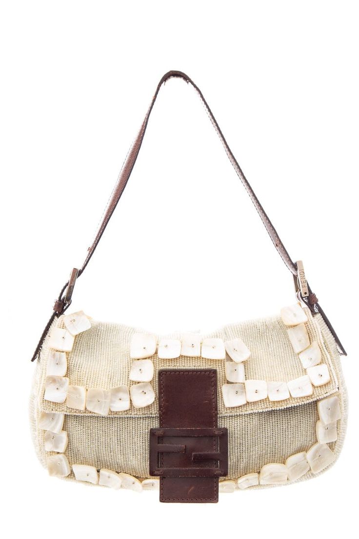 This bag is out of stock Please visit Fendi Collection Fendi Cream Shell Beaded Baguette. This item is vintage and in good condition; some scratching on leather.Length: 10"Depth: 2"Height: 6" Brand = Fendi Color = Cream Condition = Vintage Item Number: 21780-383 Item ID: 179755 Category: BaguetteDelivery 5-8 or 10-15 working days Please note that during high season and Sale period, delivery times may be affected We accept payment with a Credit card, Debit card, or PayPal.Note: Our Items are tota Fendi Baguette Vintage, Vintage Fendi Baguette, Fendi Collection, Vintage Fendi Bag, Vintage Designer Bags, Dream Bags, Vintage Fendi, Vintage Shopping, Fendi Baguette