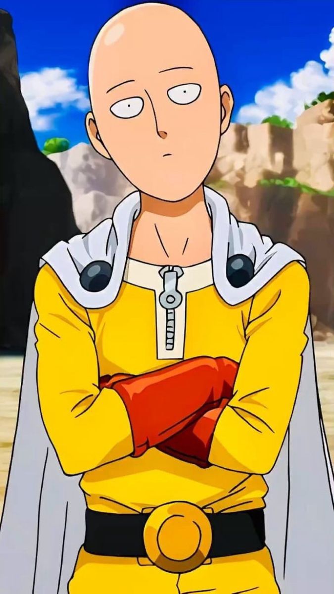 one punch man standing with his arms crossed